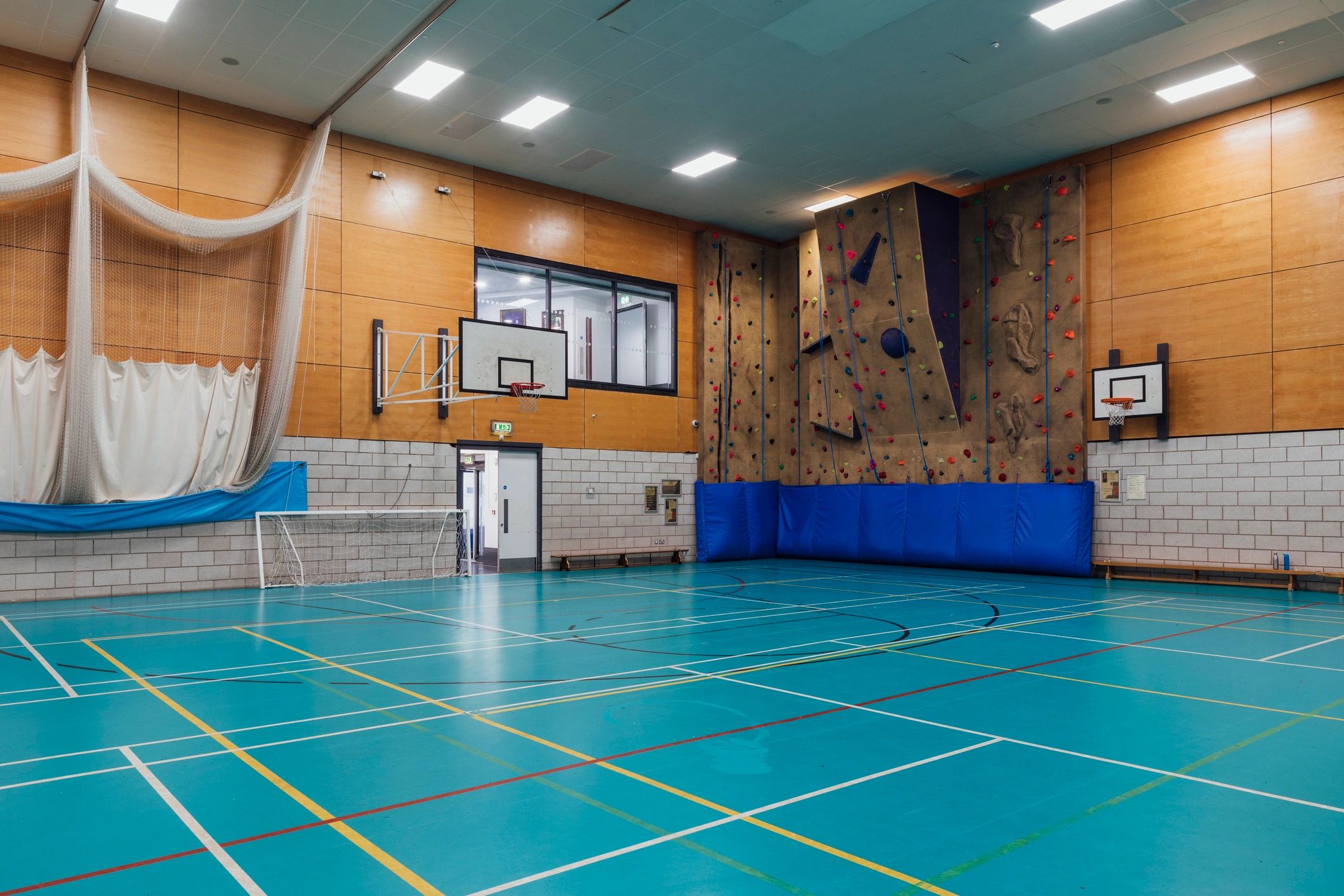 Wide view of a well equipped gym interior